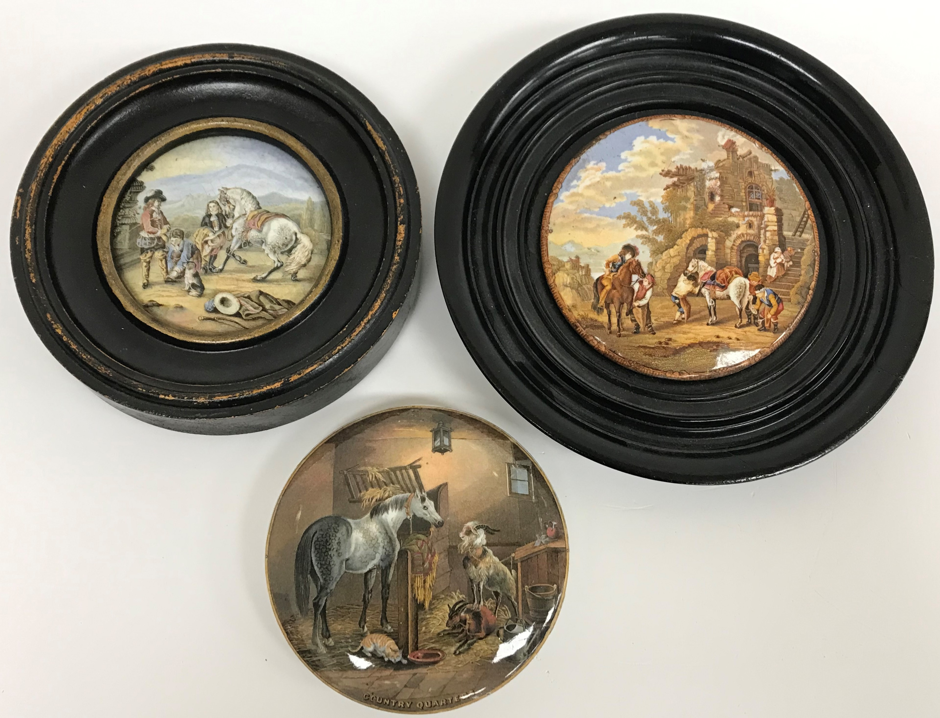 A collection of three 19th Century Pratt ware type pot lids comprising "Farriers" and "Preparing