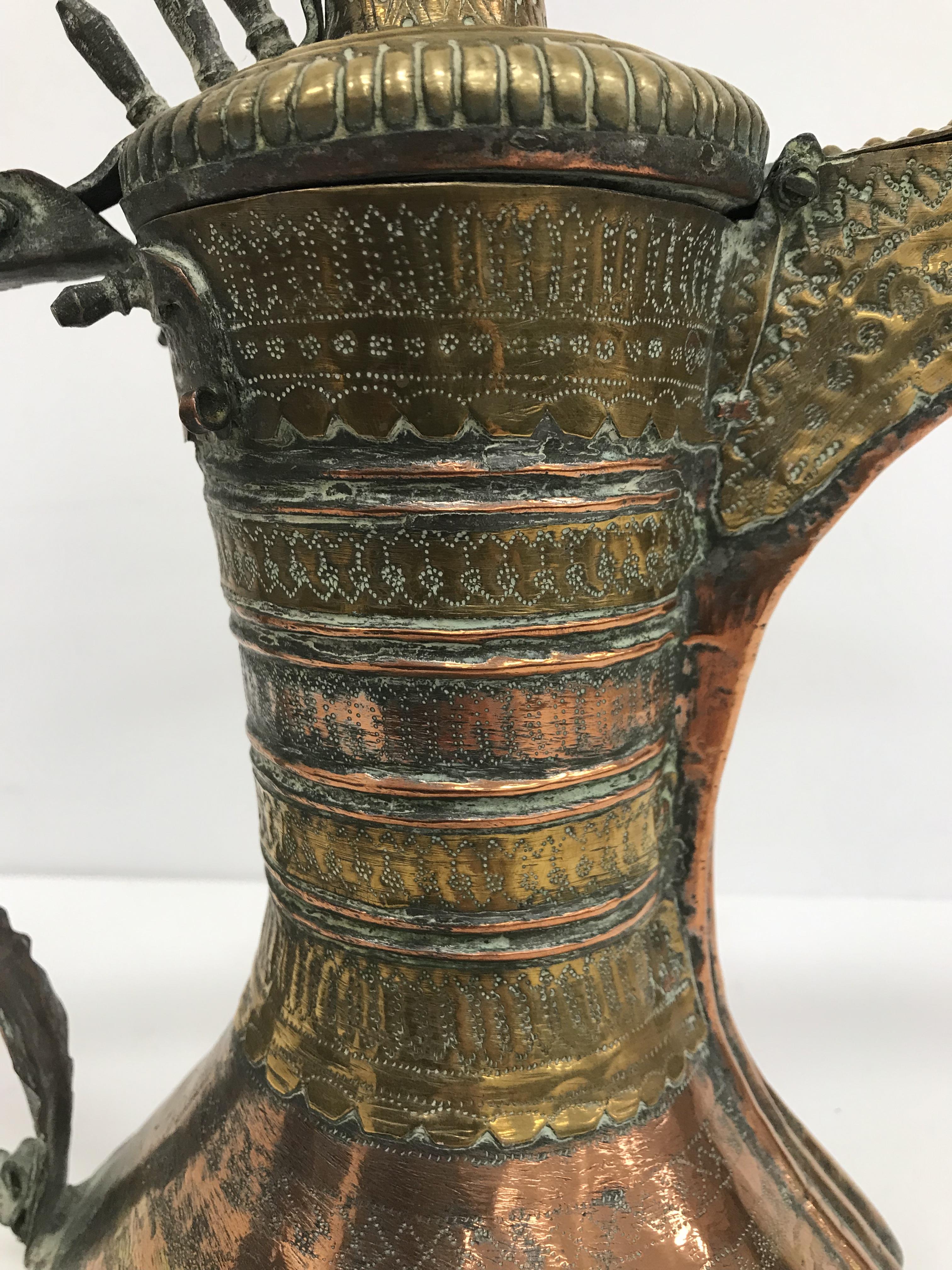 A collection of Middle Eastern and other copper wares to include two Turkish coffee pots, - Image 39 of 115