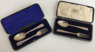 A cased silver Christening set comprising fork and spoon of plain form,