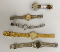 A collection of various watches bearing the name "Gucci"