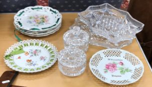 Two heavy cut glass dressing table jars and covers, together with two hobnail cut shaped trays,