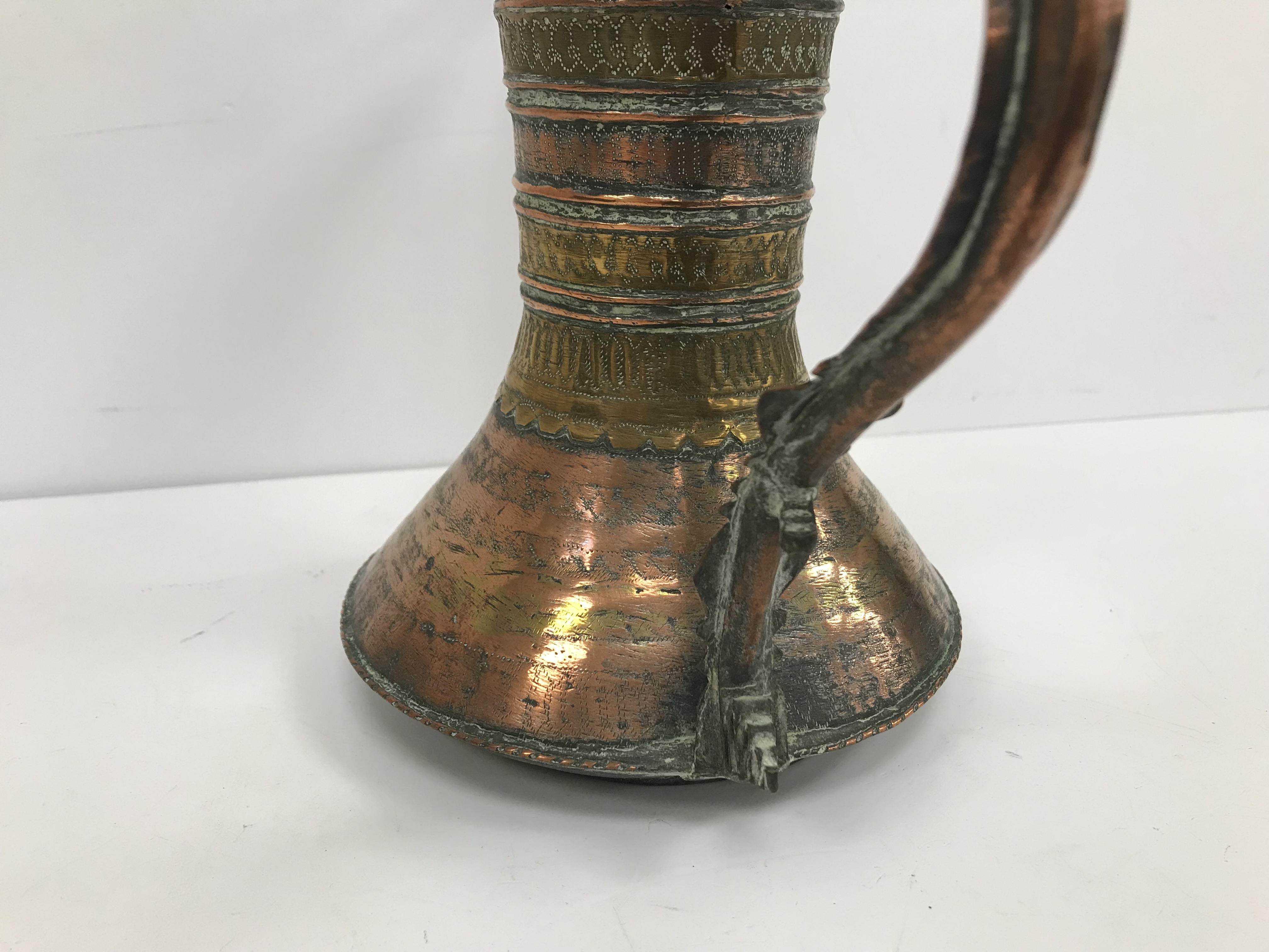 A collection of Middle Eastern and other copper wares to include two Turkish coffee pots, - Image 31 of 115