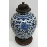 A 19th Century Chinese blue and white vase with all over foliate and floral decoration, 32.