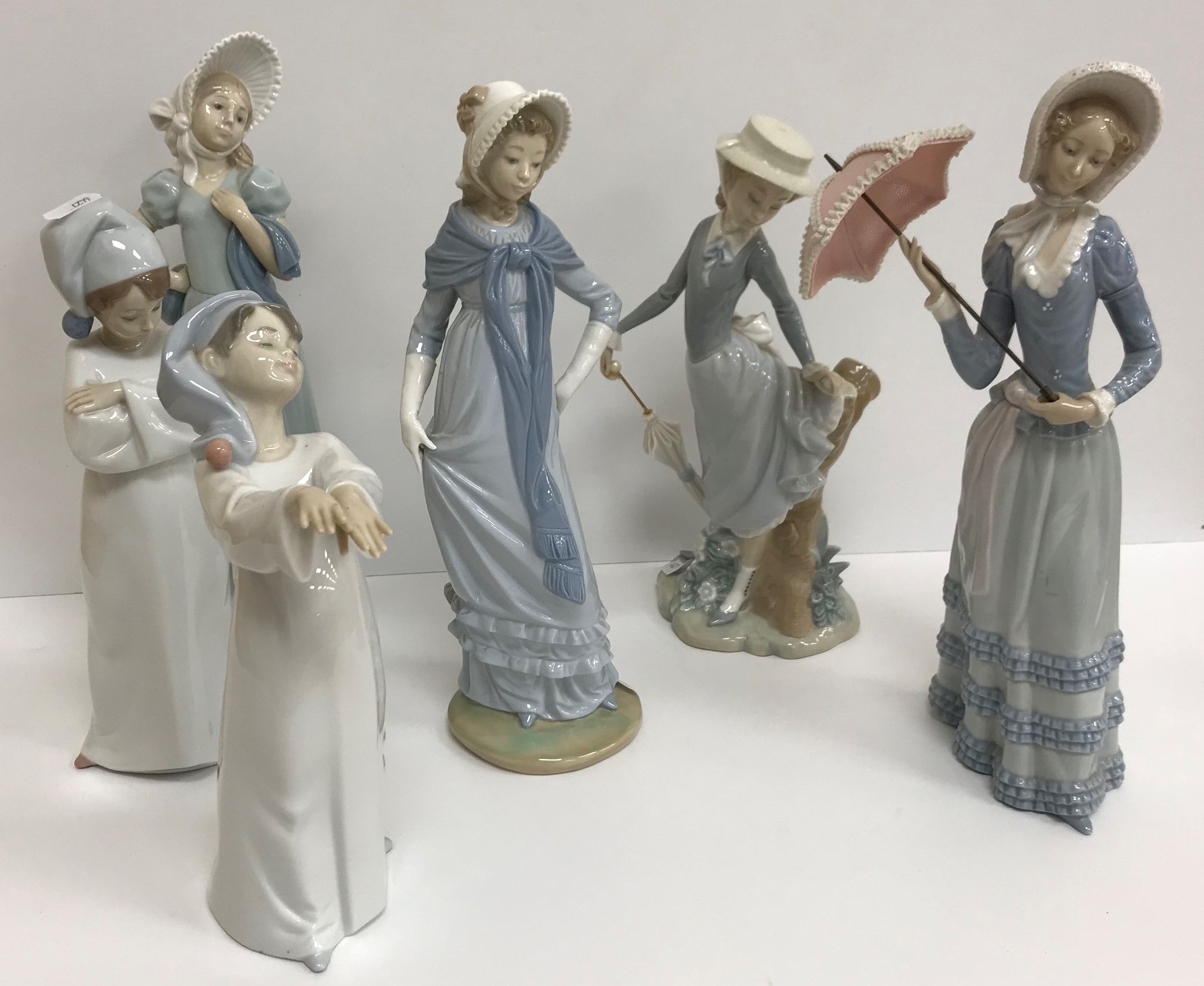 A collection of twelve Lladro figures including "Girl at pump with geese", "Two nuns", - Image 2 of 2