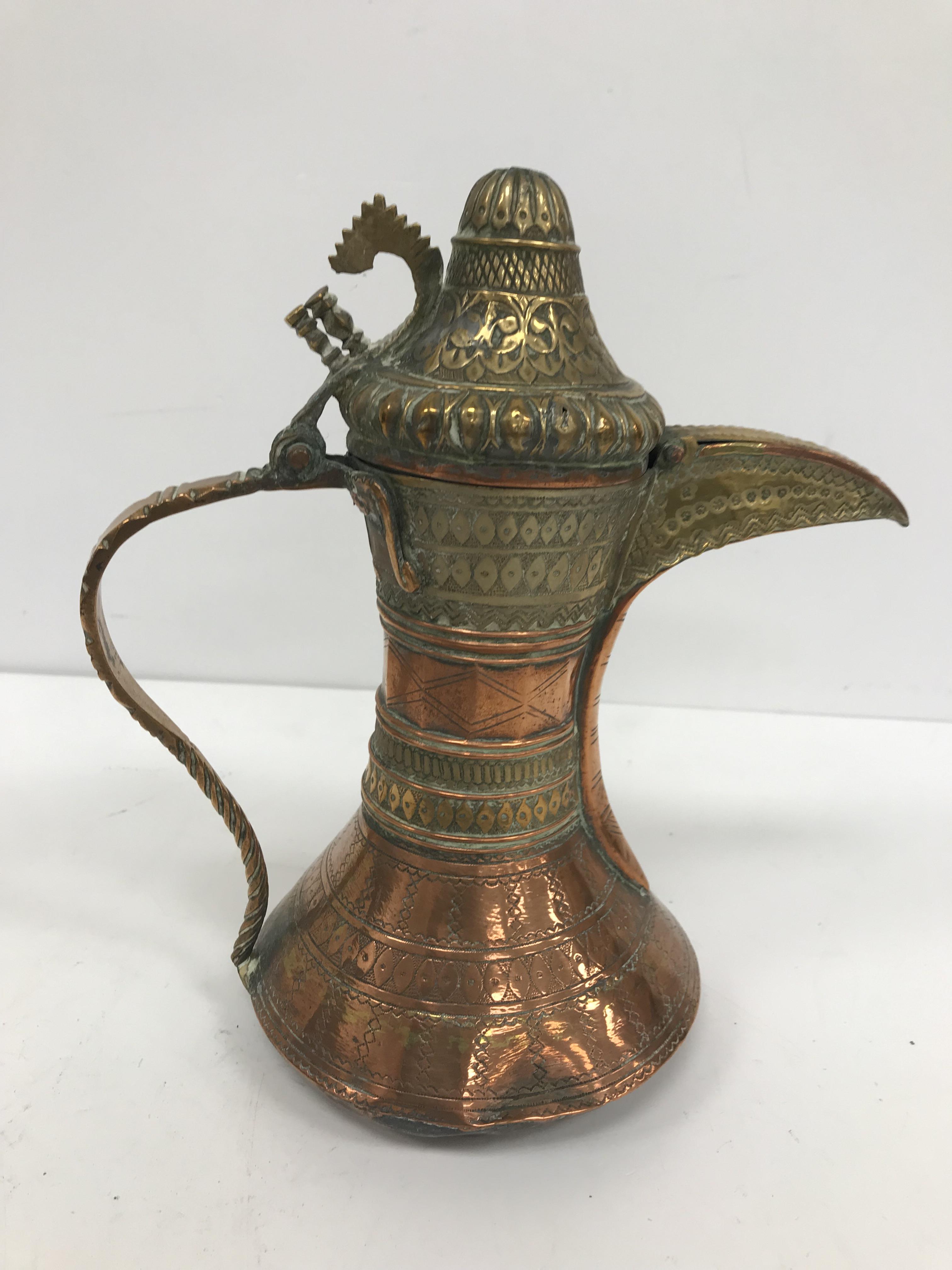 A collection of Middle Eastern and other copper wares to include two Turkish coffee pots, - Image 78 of 115