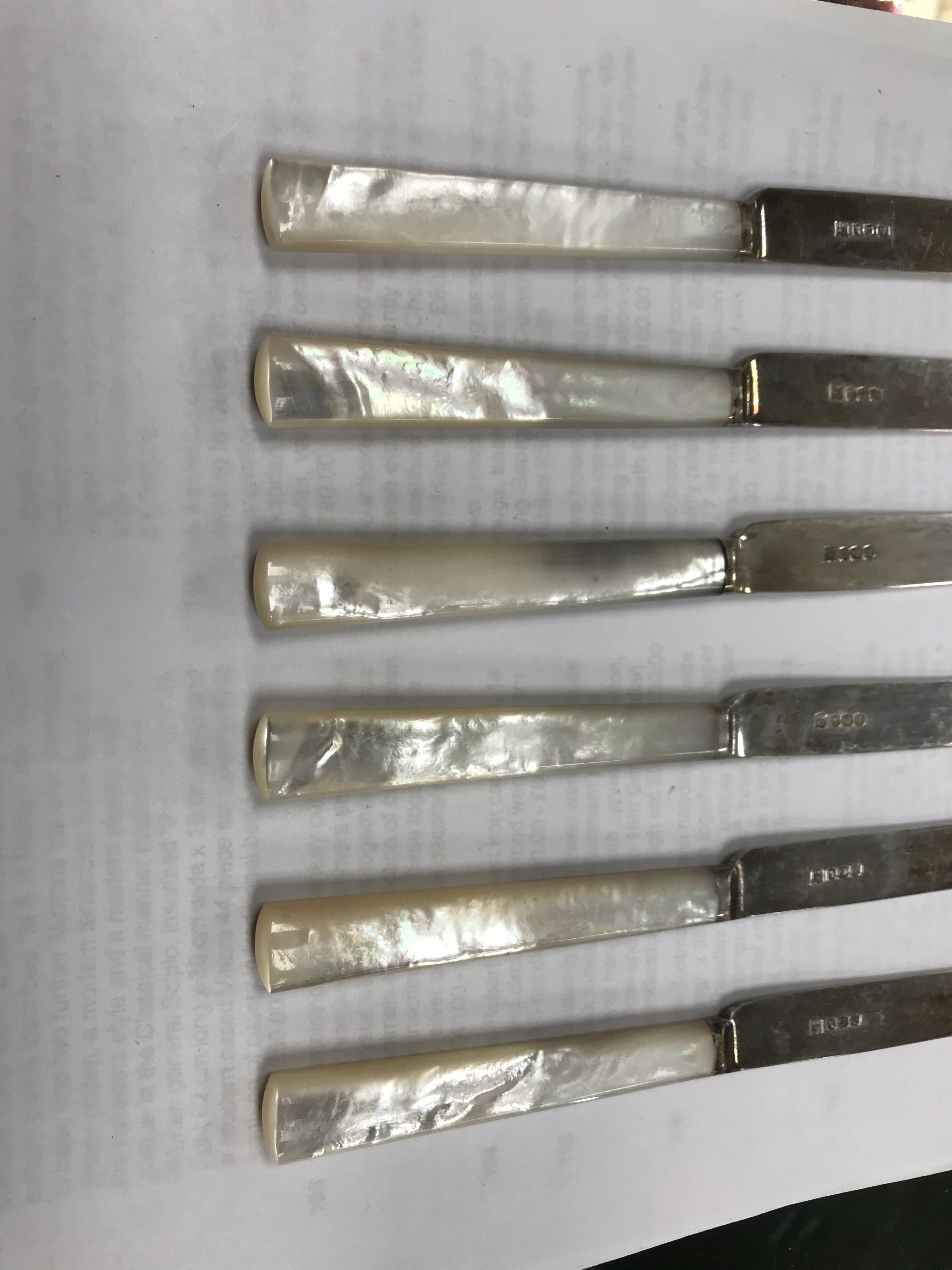 A cased set of six silver bladed and tined mother of pearl handled fruit knives and forks (by James - Image 14 of 26