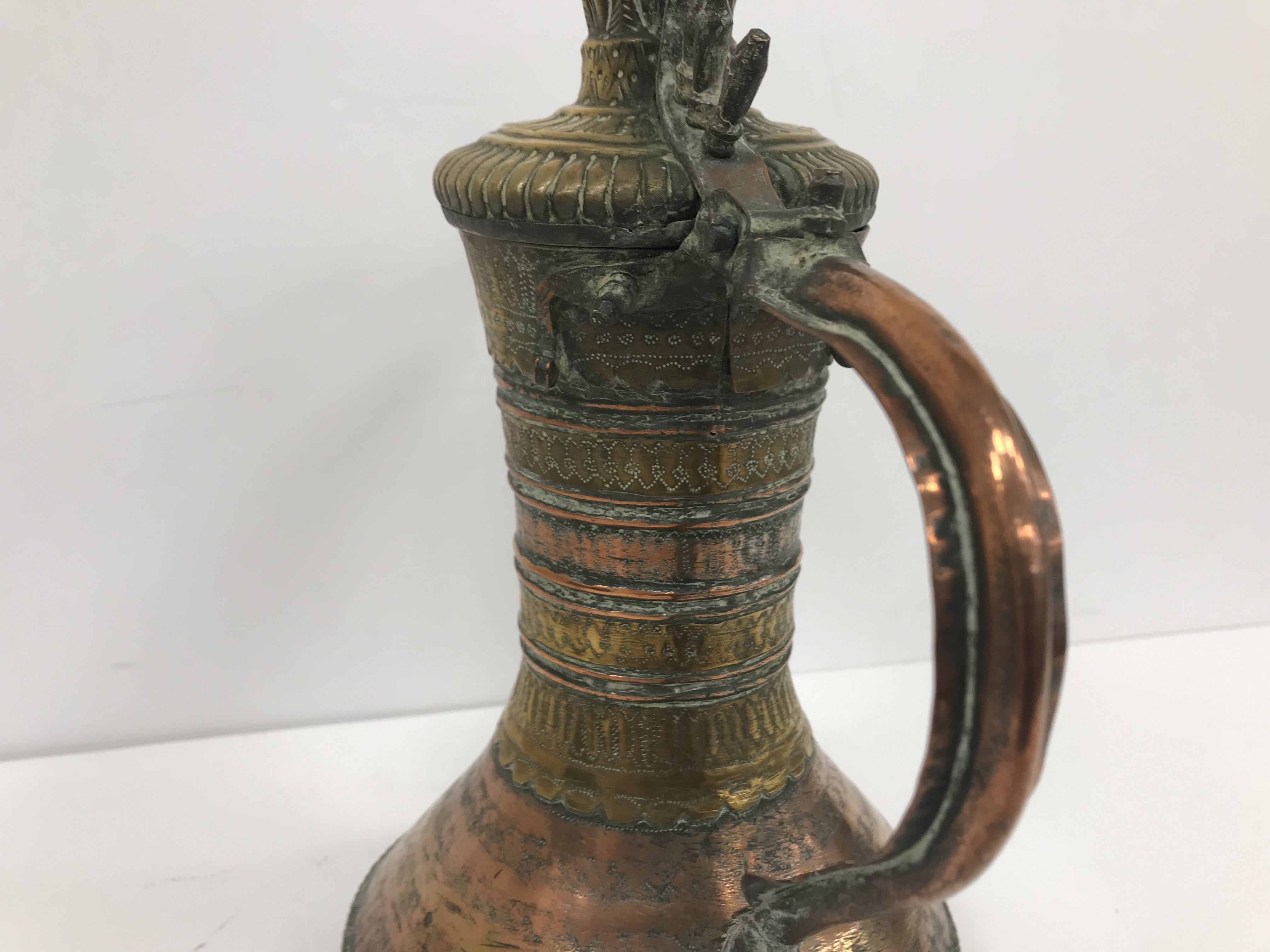 A collection of Middle Eastern and other copper wares to include two Turkish coffee pots, - Image 30 of 115