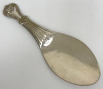 A plated rice spoon, 22.