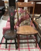 A circa 1900 oak stick back panel seat chair in the American style and a carved oak spinning chair