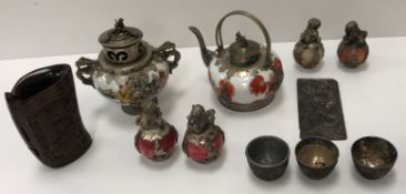 A collection of various Chinese and Sino Tibetan items including a pair of figures of dogs of Fo or