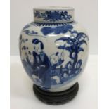 A 19th Century Chinese blue and white ginger jar and cover decorated with figures playing music and