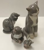 Three various Bing & Grondahl figures of "Grey cats", tallest 18.