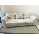 A modern cream faux suede upholstered three piece suite, sofa 212 cm wide, chairs 100 cm wide,