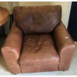 A "The Vintage Tanning Company" (Halo) brown leather upholstered armchair 97 cm wide x 87 cm deep x