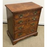 A modern burr elm bachelors chest of small proportions in the 18th Century manner,