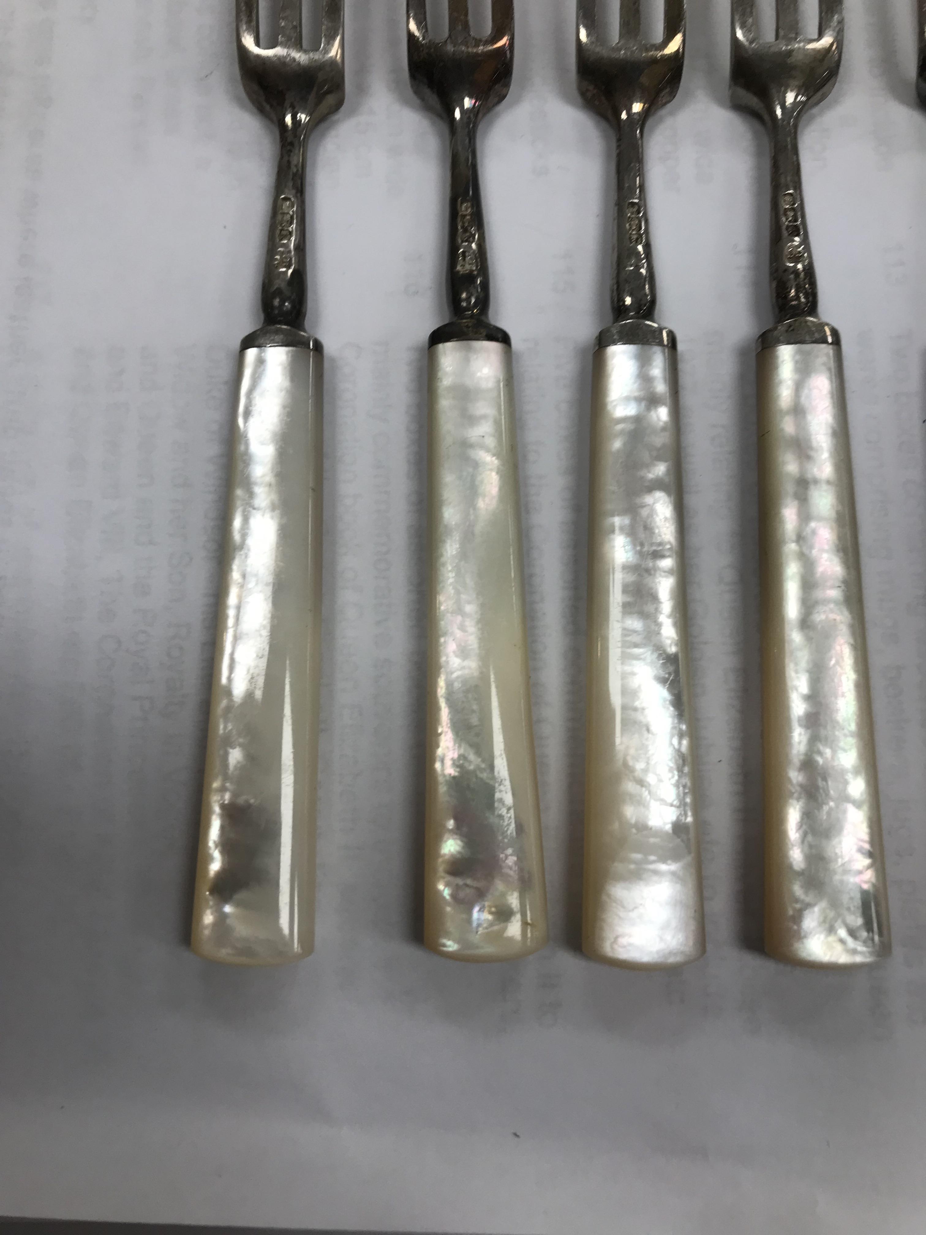 A cased set of six silver bladed and tined mother of pearl handled fruit knives and forks (by James - Image 8 of 26