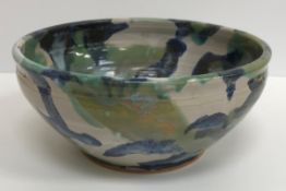 A Janice Tchalenko fruit bowl in blues and greens, 28 cm diameter x 12.