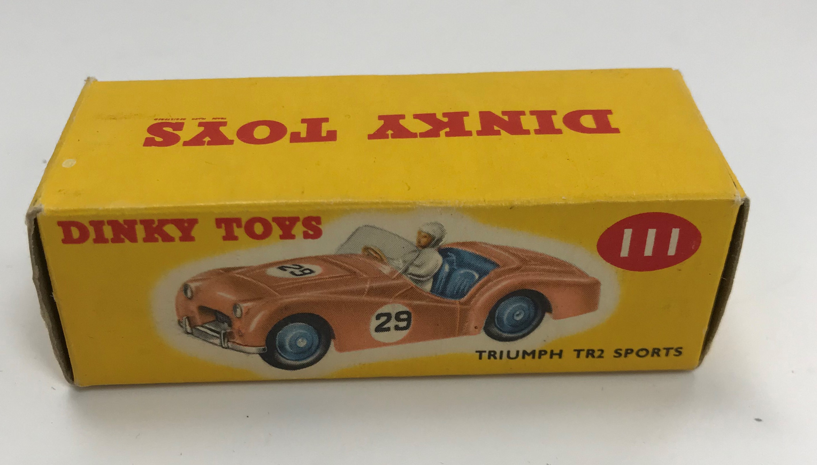 A Dinky Toys Triumph TR2 Sports (111) pale blue with racing paintwork and red hubs (boxed), - Image 2 of 5