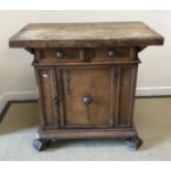 A late 17th or early 18th Century Italian walnut credenza or side cabinet,