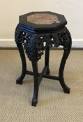 A 19th Century Chinese rosewood urn stand,
