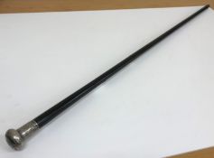 A silver topped ebonised walking cane,