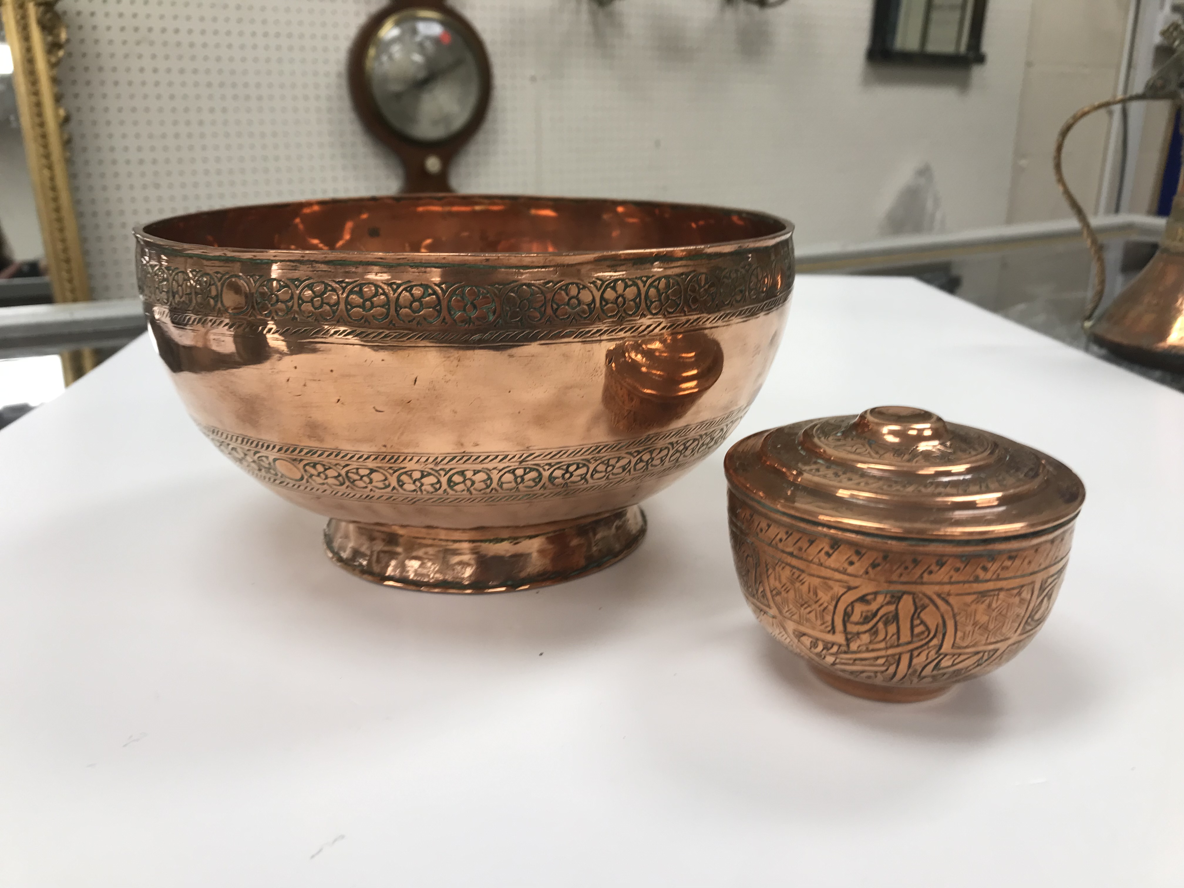 A collection of Middle Eastern and other copper wares to include two Turkish coffee pots, - Image 10 of 115