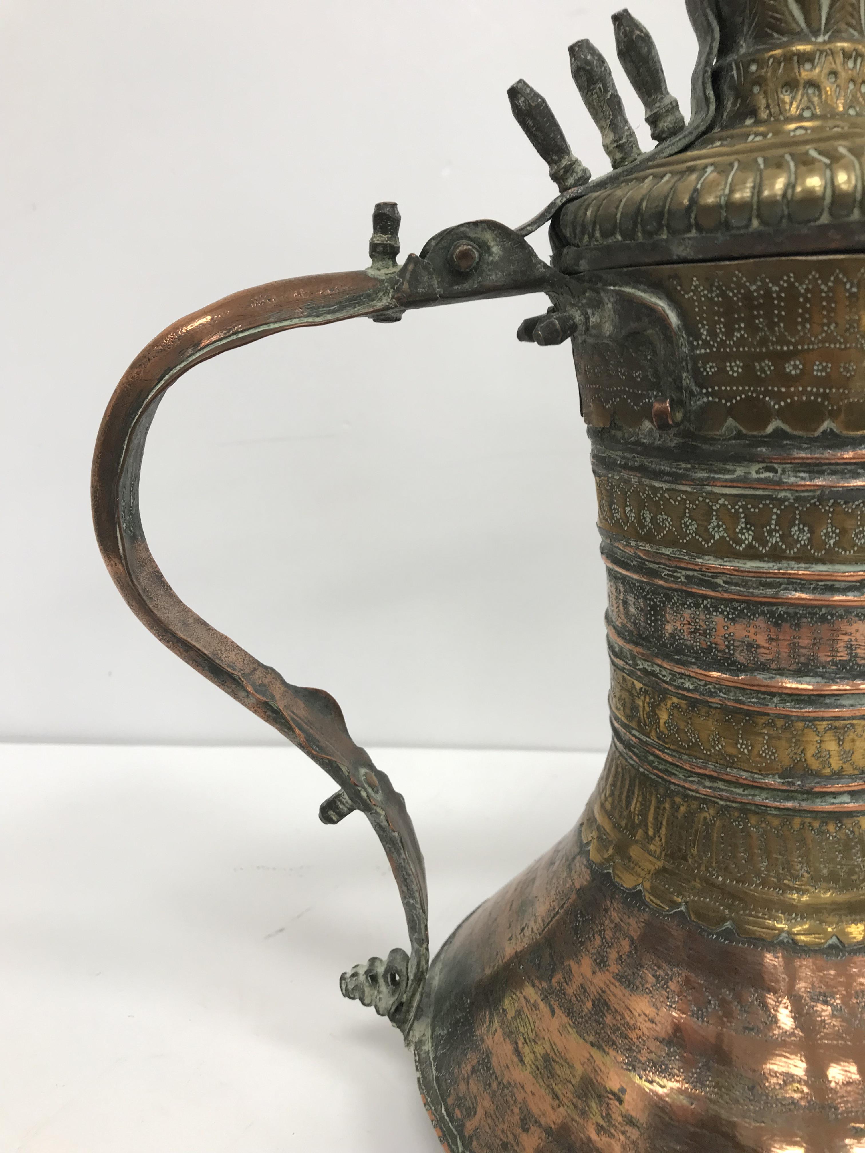 A collection of Middle Eastern and other copper wares to include two Turkish coffee pots, - Image 37 of 115