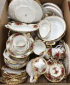 A box containing a large quantity of Royal Albert "Old Country Roses" dinner / tea wares including