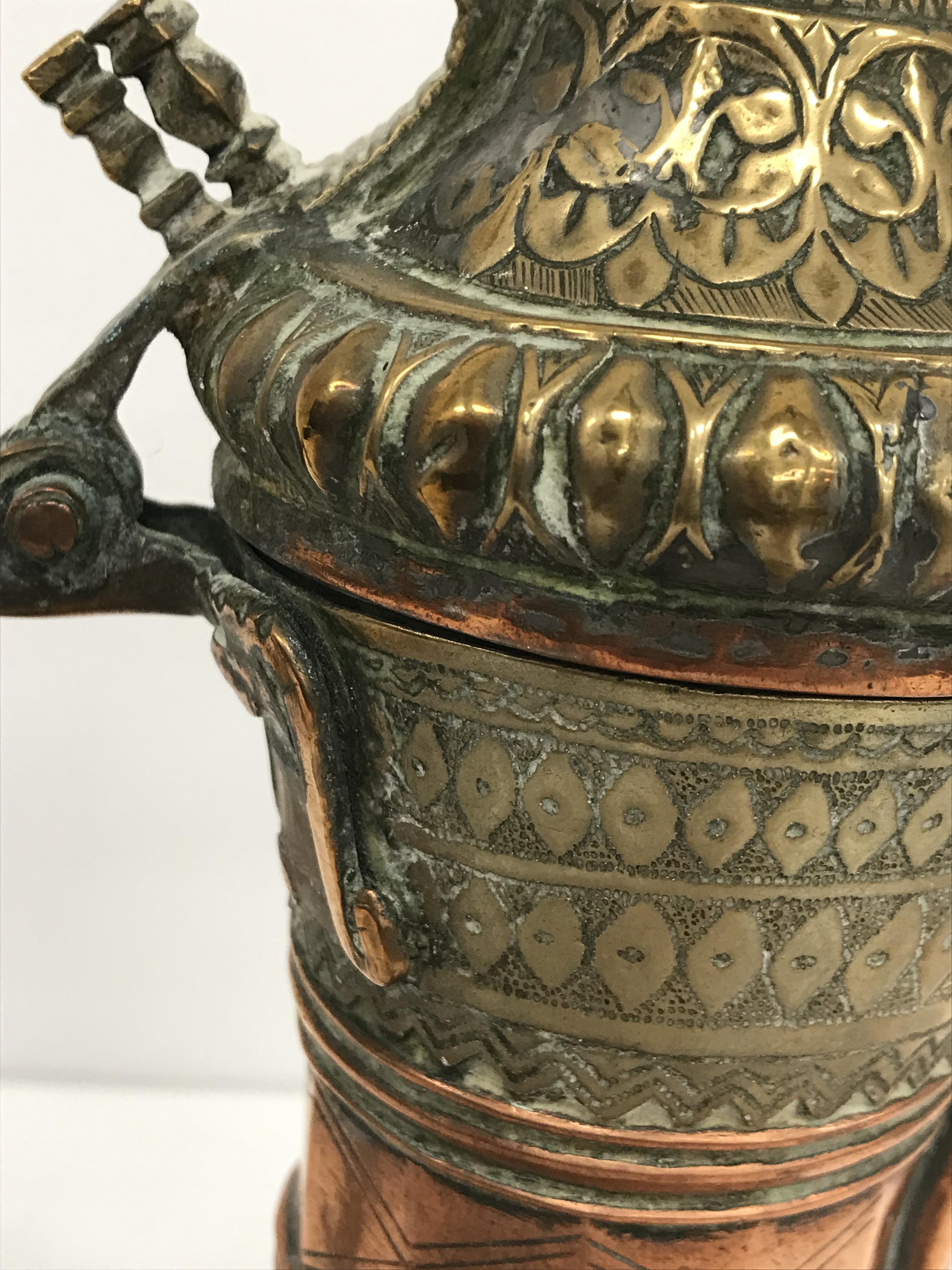 A collection of Middle Eastern and other copper wares to include two Turkish coffee pots, - Image 87 of 115