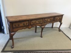 A modern North Country fruitwood and cross-banded dresser in the 18th Century style,