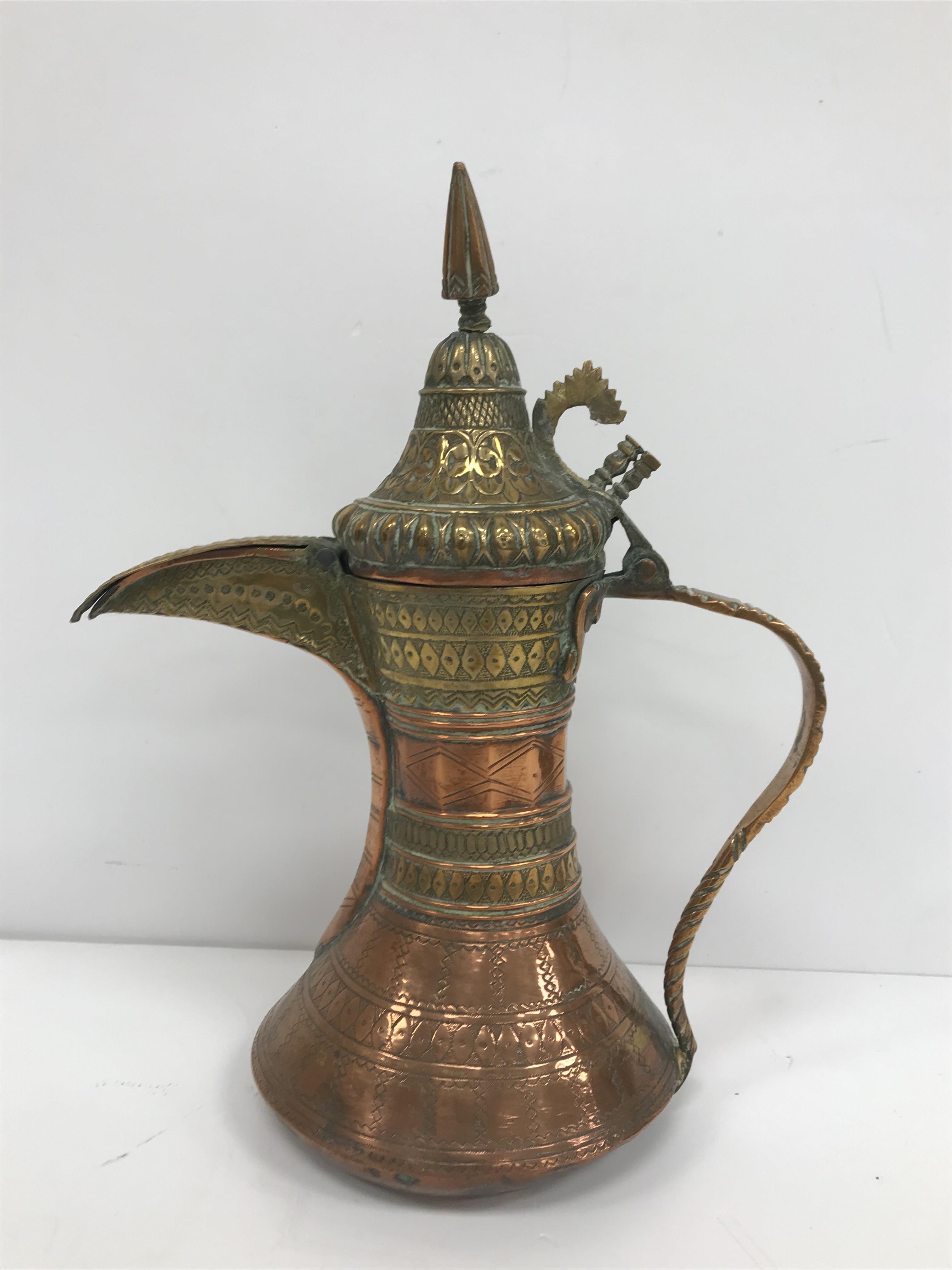 A collection of Middle Eastern and other copper wares to include two Turkish coffee pots, - Image 61 of 115