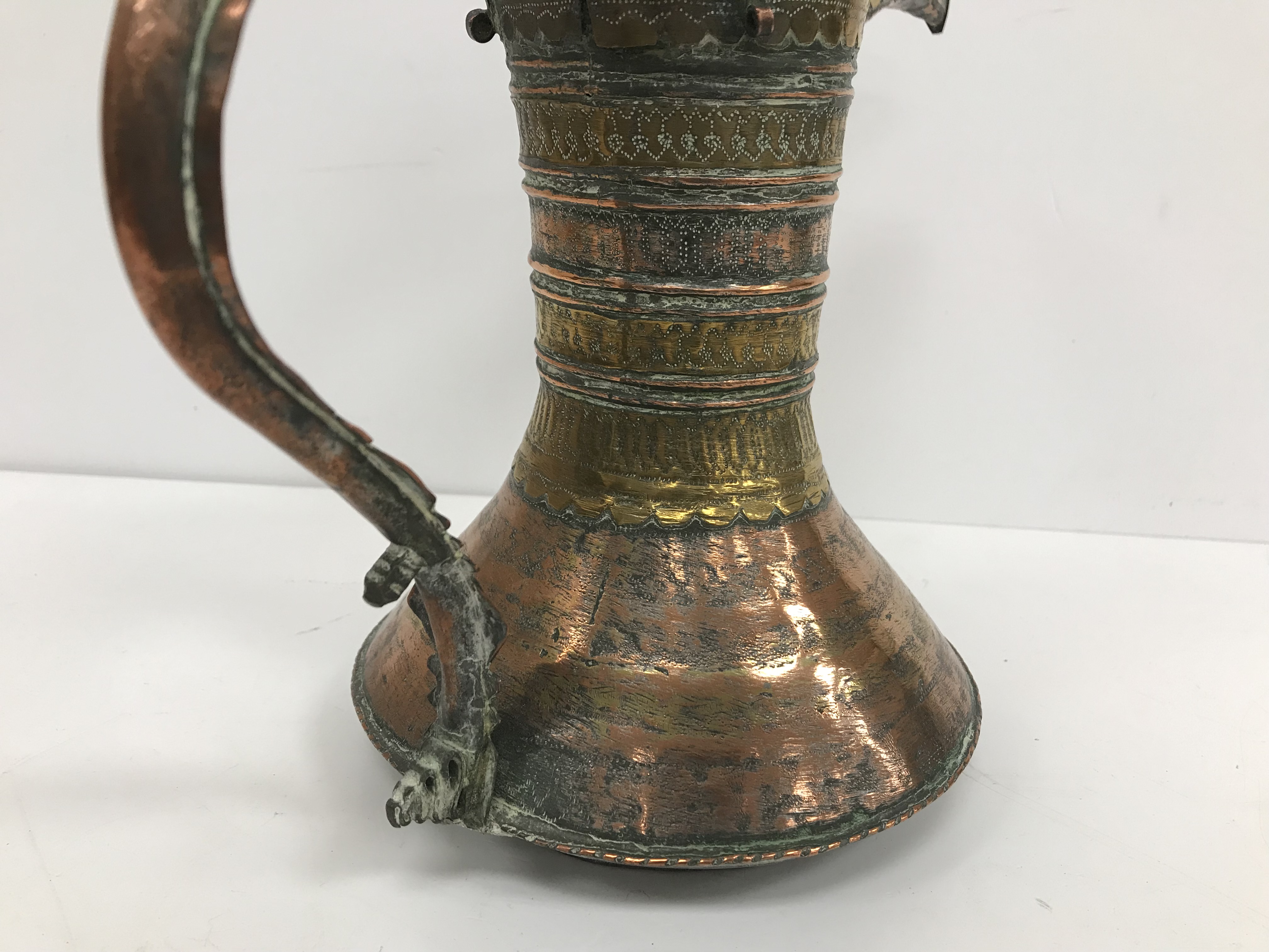 A collection of Middle Eastern and other copper wares to include two Turkish coffee pots, - Image 33 of 115