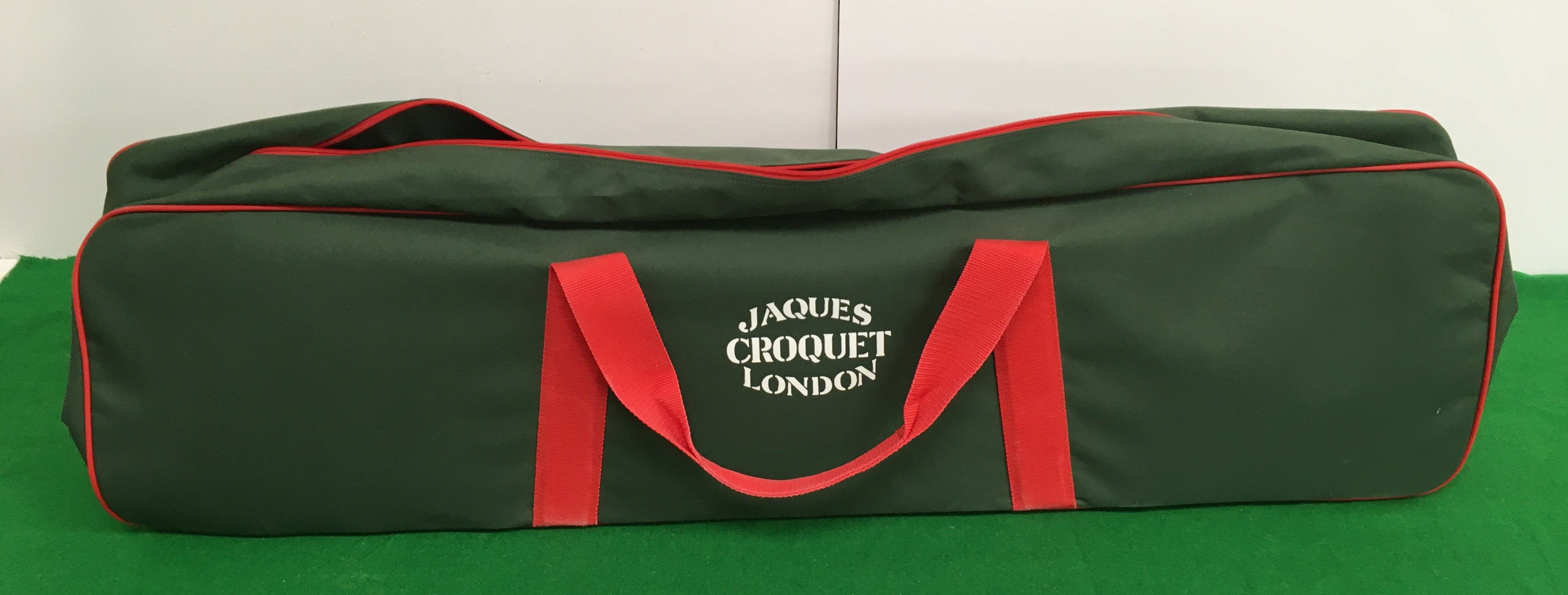 A modern Jaques croquet set housed in a canvas bag