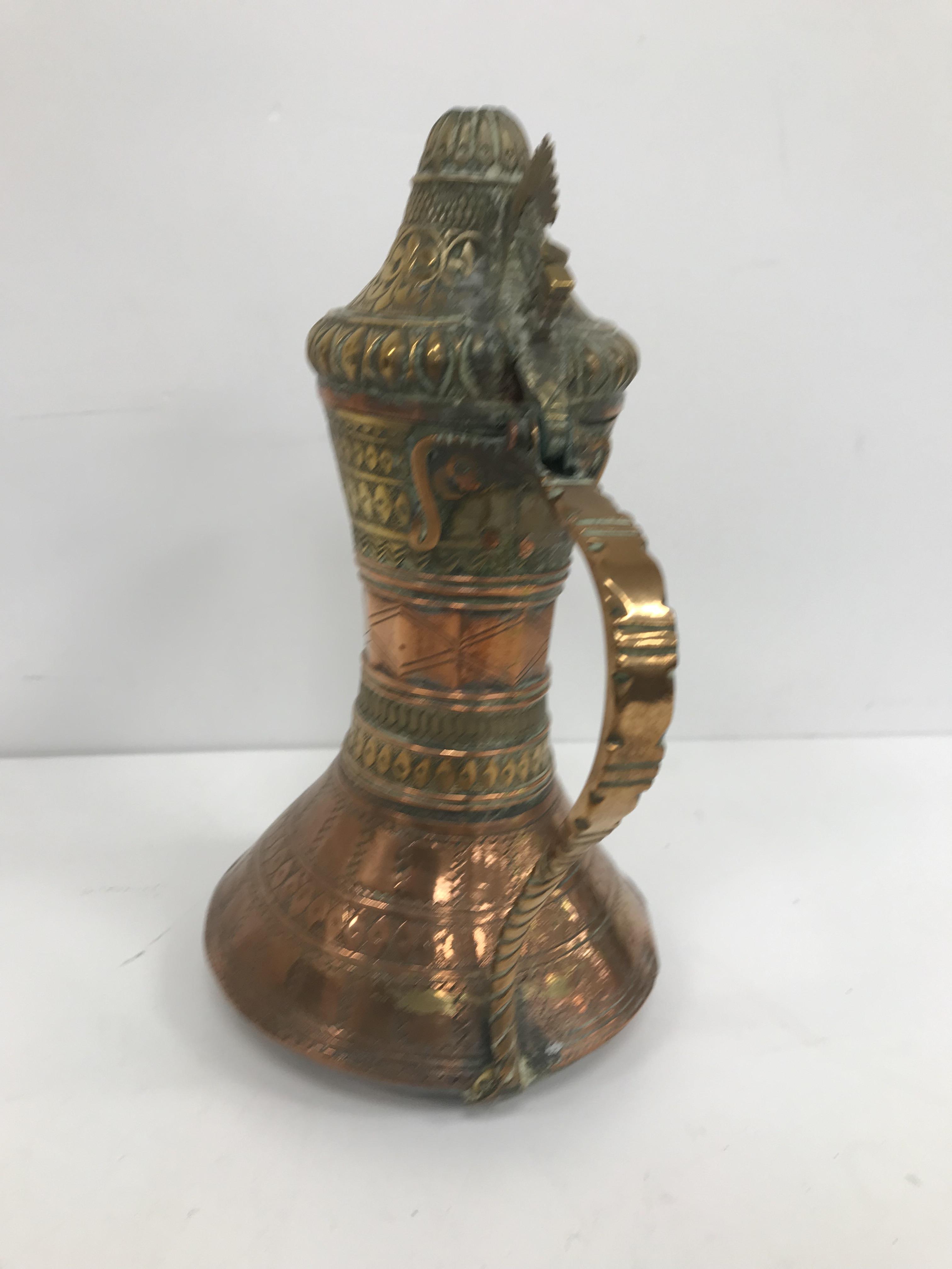 A collection of Middle Eastern and other copper wares to include two Turkish coffee pots, - Image 71 of 115