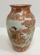 A collection of Japanese Meiji period Kutani ware vases including a moon flask shaped vase with