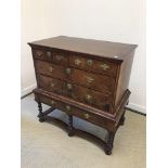 A 19th Century walnut chest on stand,