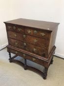 A 19th Century walnut chest on stand,