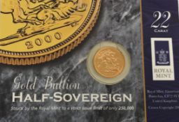A Millenium 2000 Elizabeth II half sovereign,