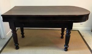 An early 19th Century rosewood bagatelle table of D end form,