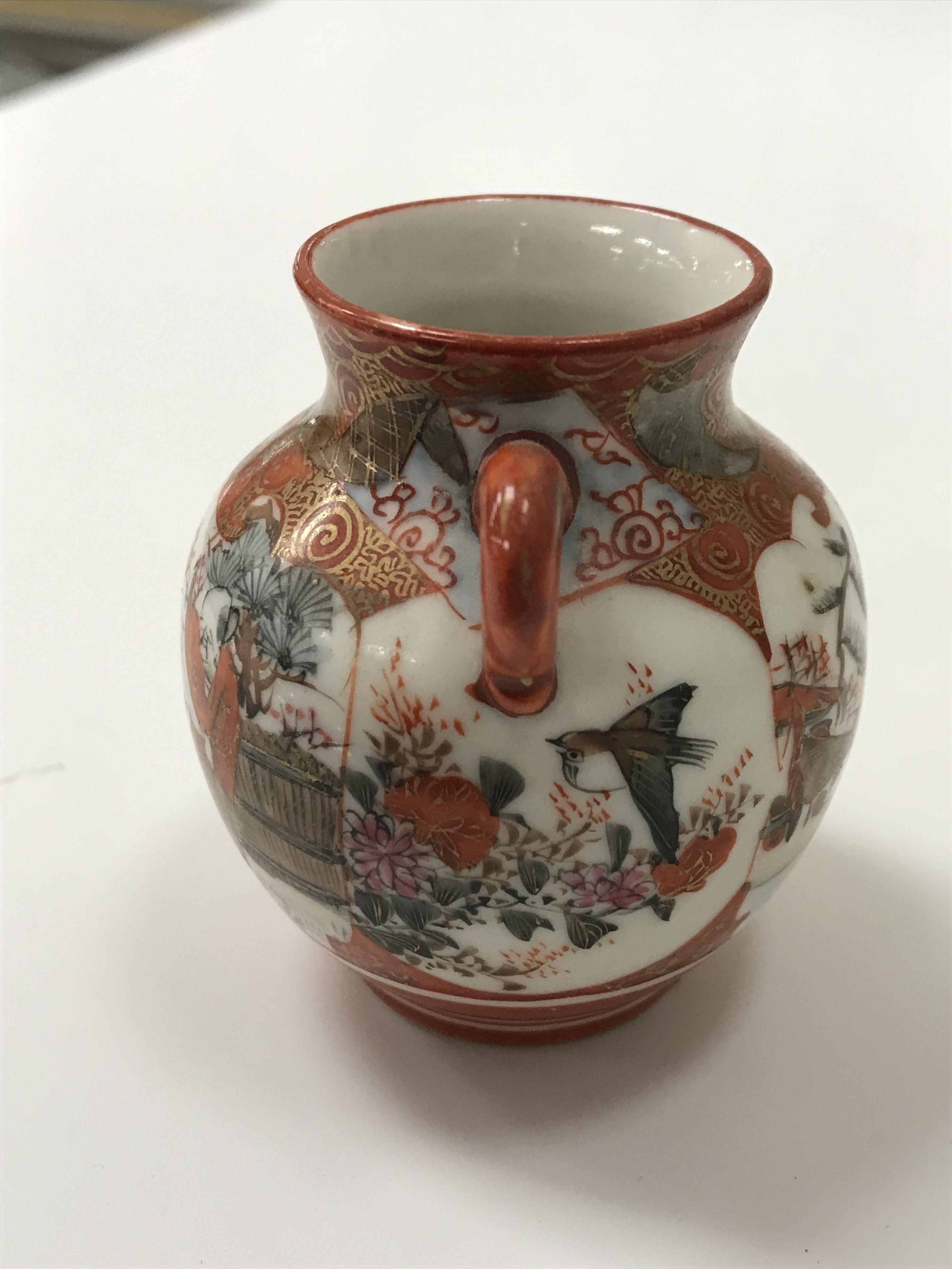 A collection of Japanese Meiji period Kutani ware vases including a moon flask shaped vase with - Image 108 of 152