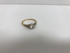 A gold mounted solitaire diamond ring, approx 0.