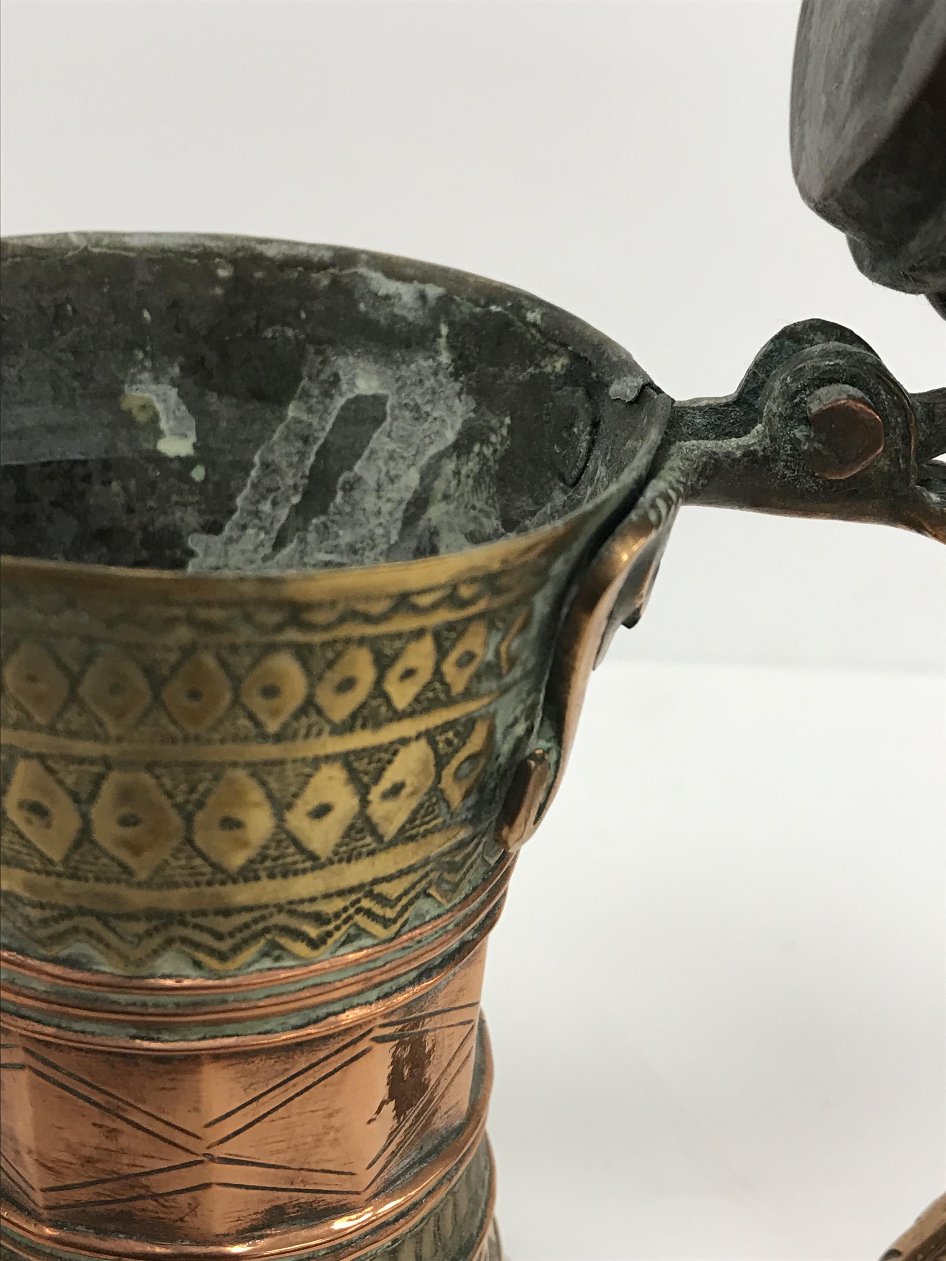 A collection of Middle Eastern and other copper wares to include two Turkish coffee pots, - Image 102 of 115