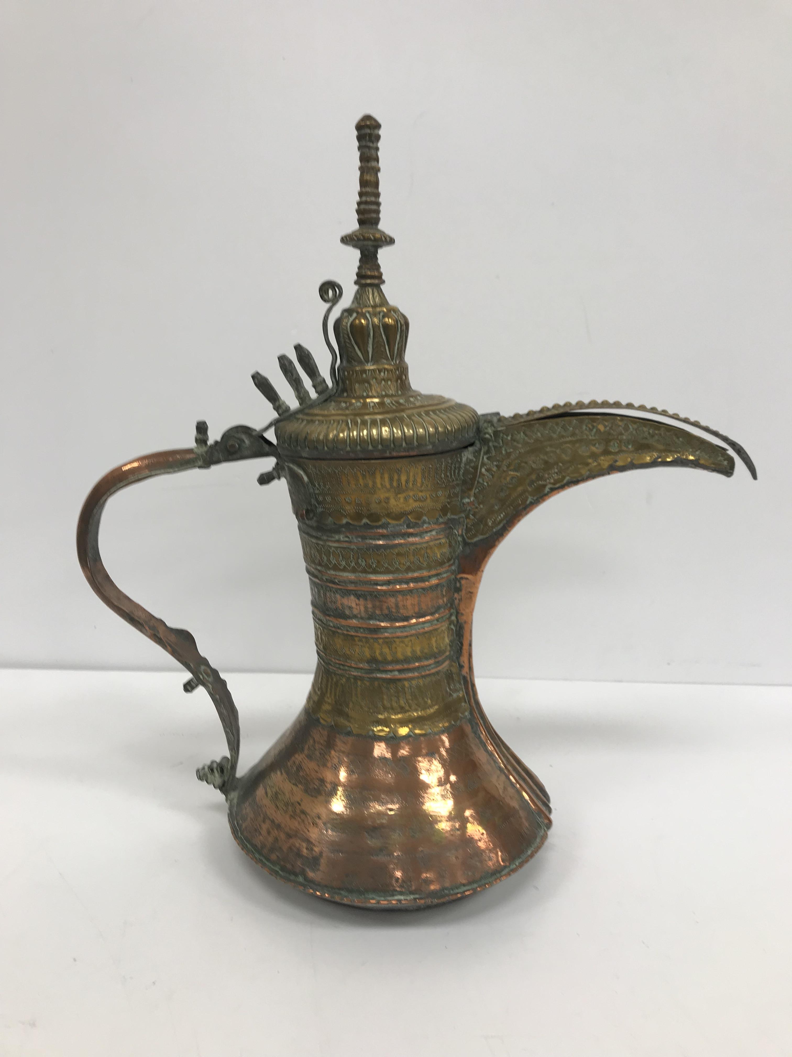 A collection of Middle Eastern and other copper wares to include two Turkish coffee pots, - Image 35 of 115