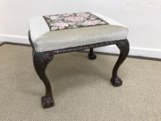 A circa 1900 needlework and velvet upholstered stool in the Georgian style,