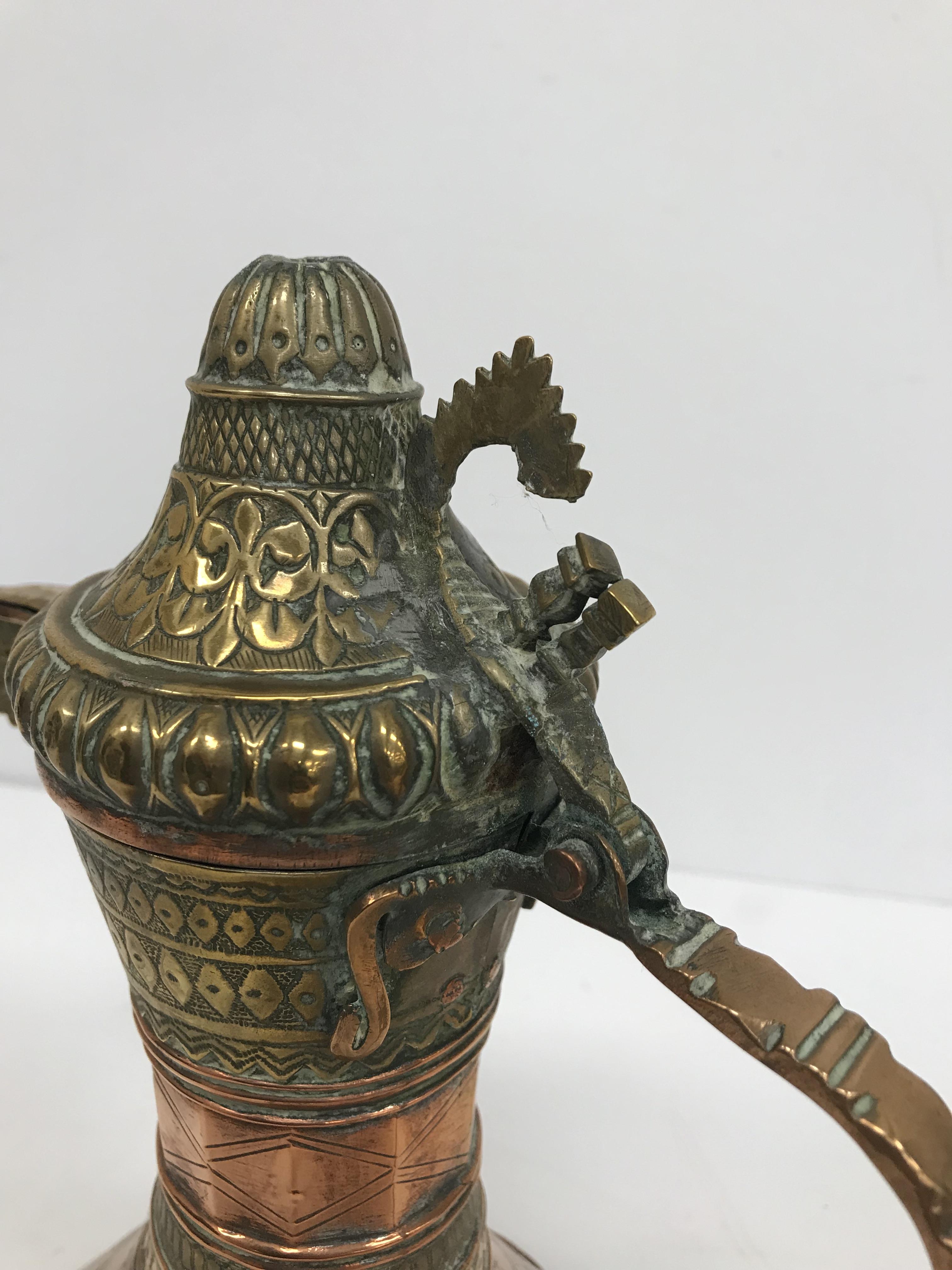 A collection of Middle Eastern and other copper wares to include two Turkish coffee pots, - Image 68 of 115