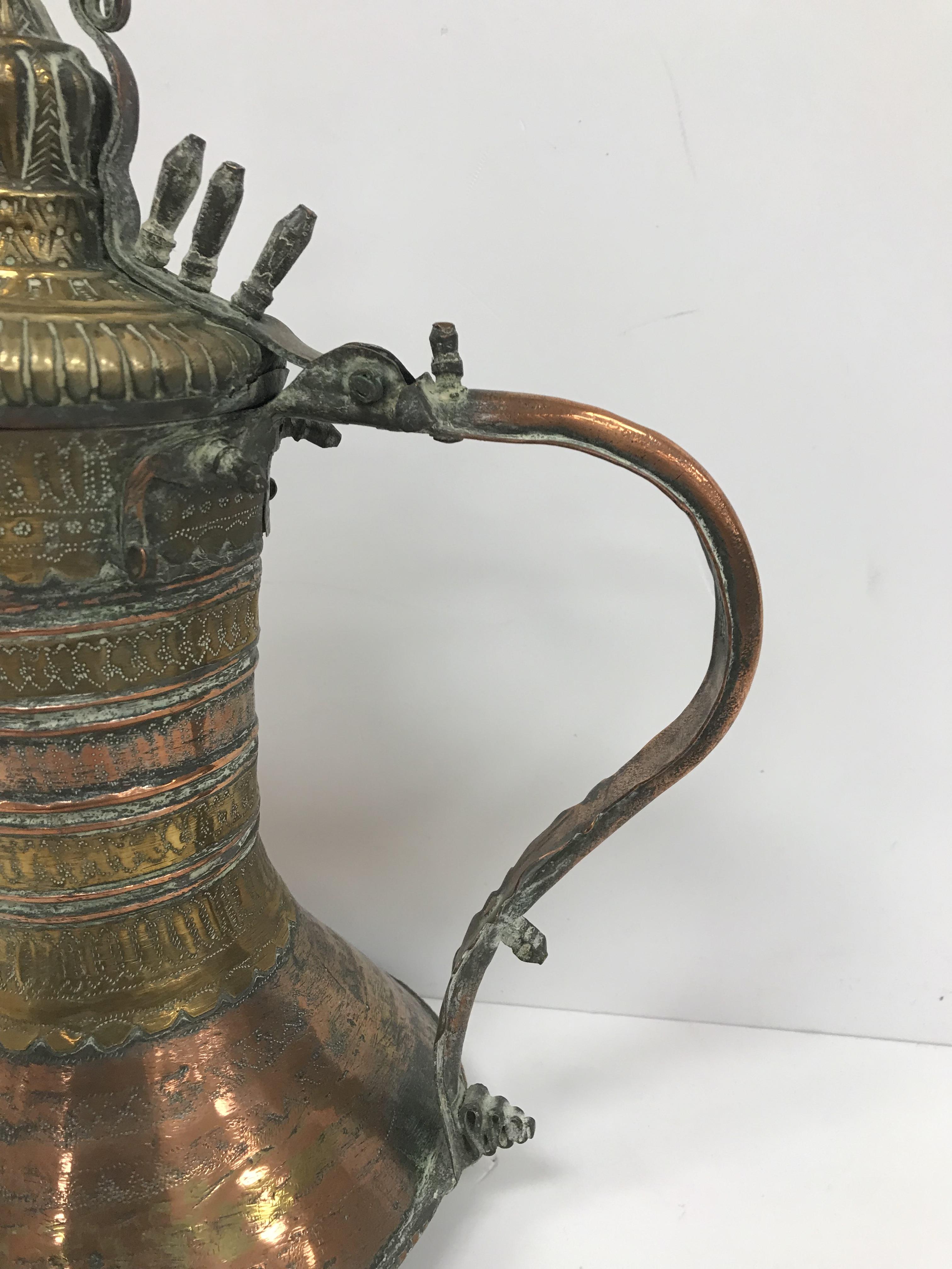 A collection of Middle Eastern and other copper wares to include two Turkish coffee pots, - Image 22 of 115