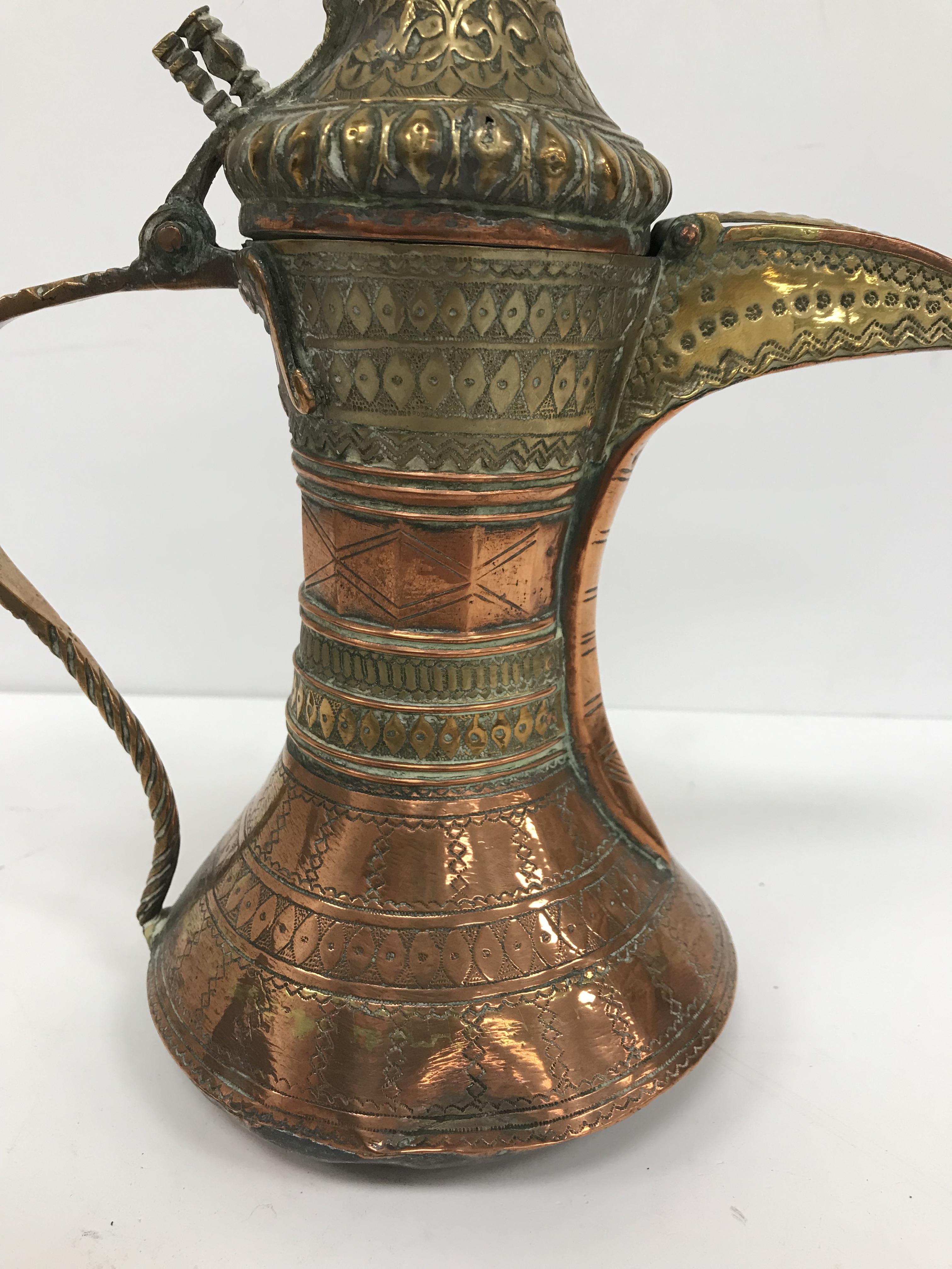 A collection of Middle Eastern and other copper wares to include two Turkish coffee pots, - Image 84 of 115