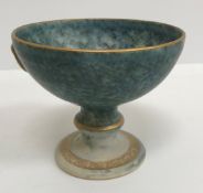 A collection of four mottled blue and gilt decorated pottery items including bowl,