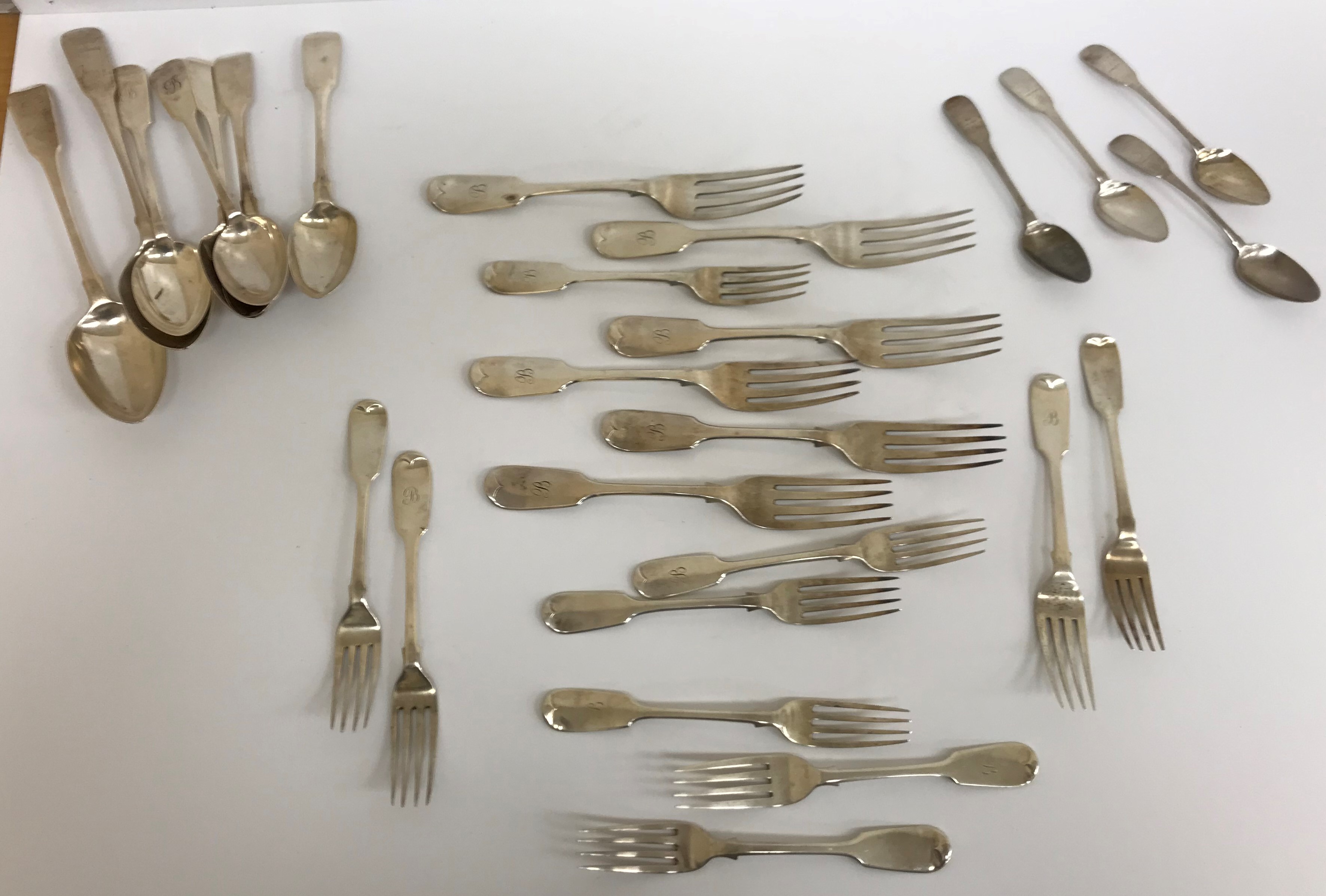 Six silver "Fiddle" pattern table forks and six silver "Fiddle" pattern dessert forks (by John