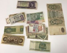 A collection of various World coinage and bank notes including a 1924 silver dollar,
